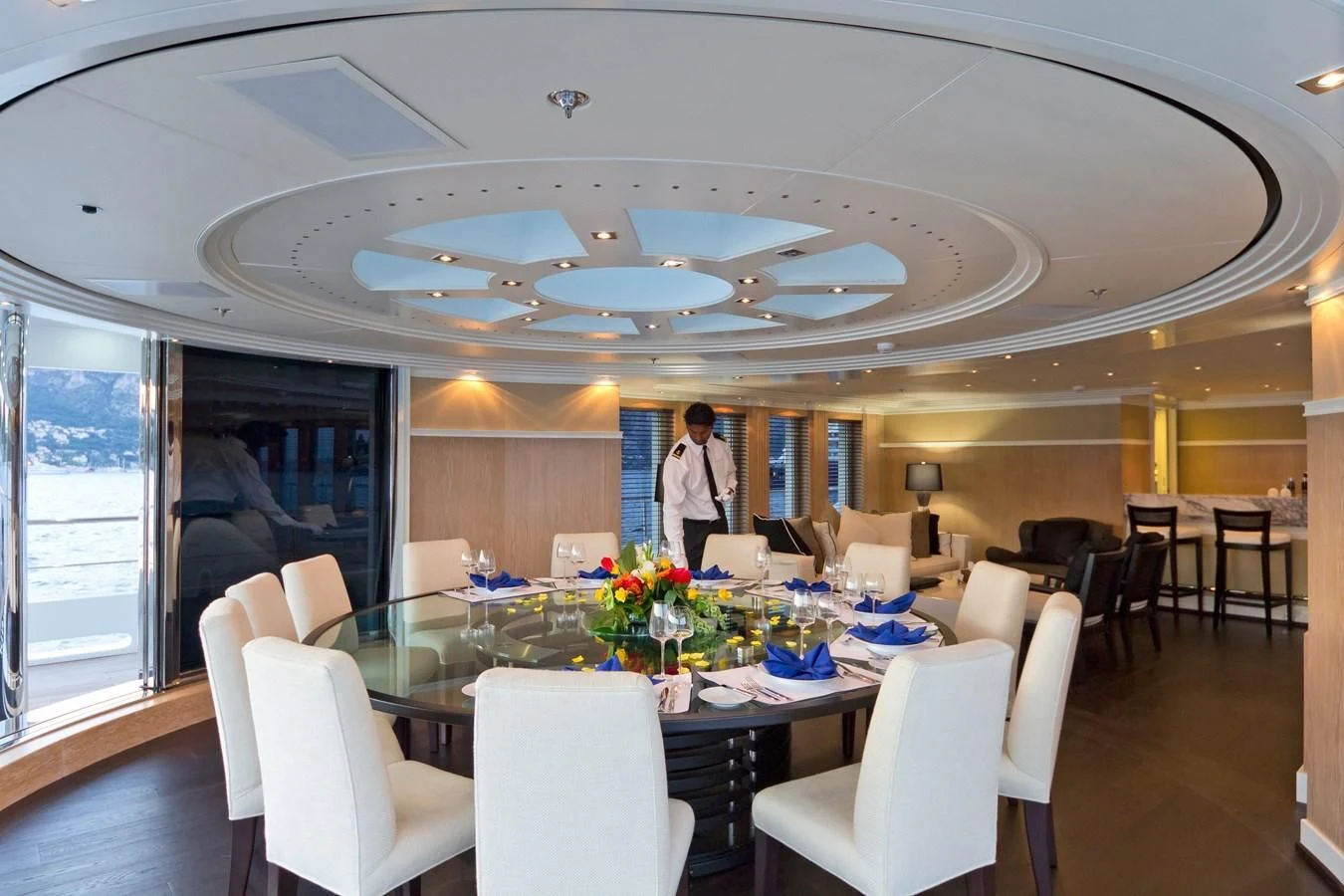 a person standing at a table aboard BELLA 2 Yacht for Sale
