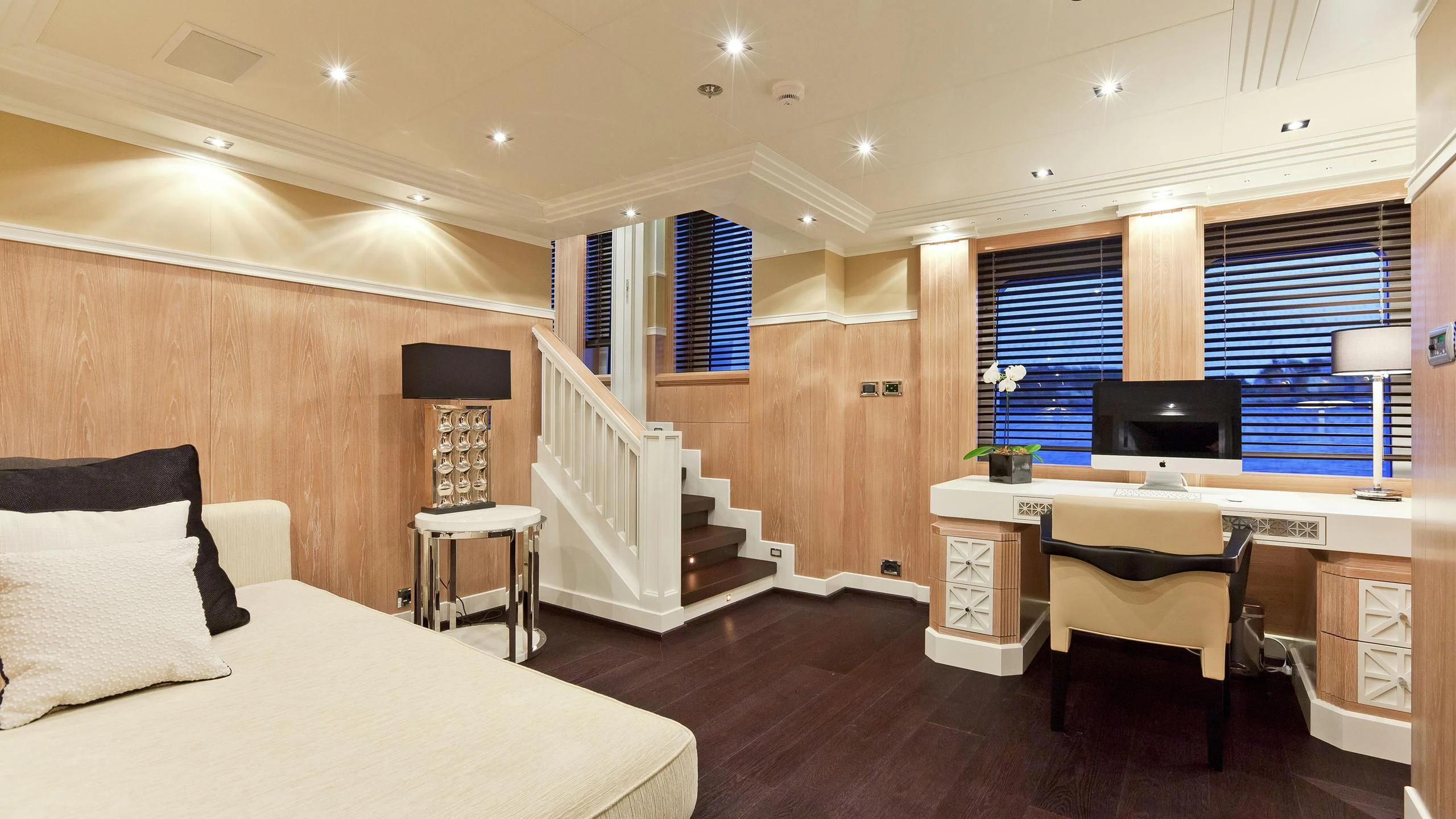 a room with a bed and a desk aboard BELLA 2 Yacht for Sale
