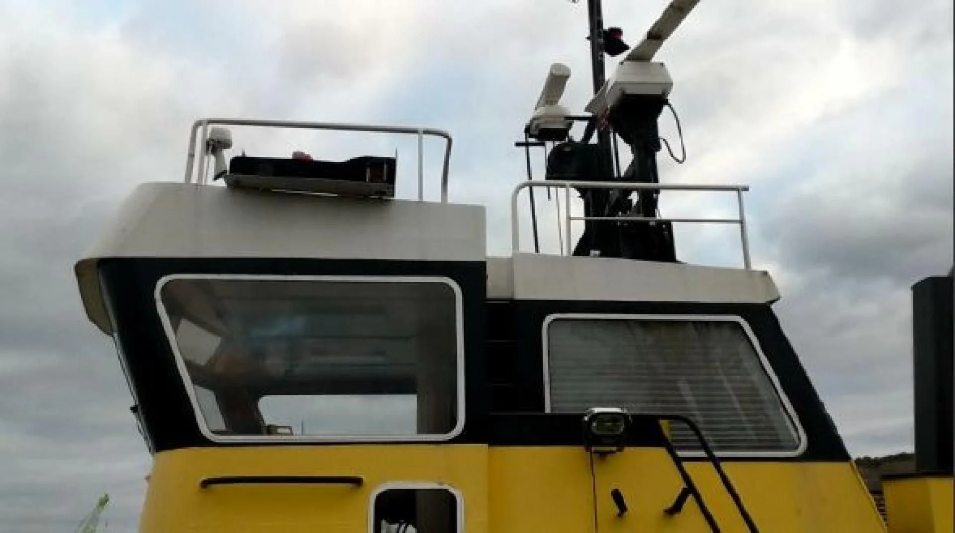 a white and yellow boat aboard ITINERANTE I Yacht for Sale