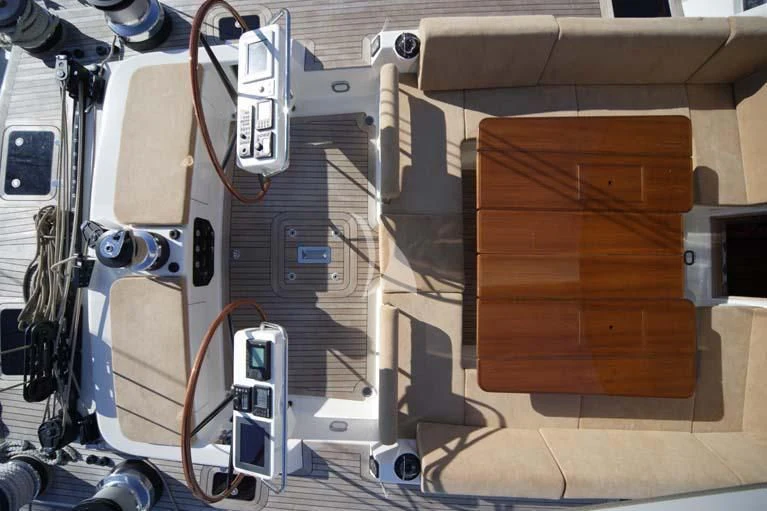 a large wooden box in a room aboard DHARMA Yacht for Sale