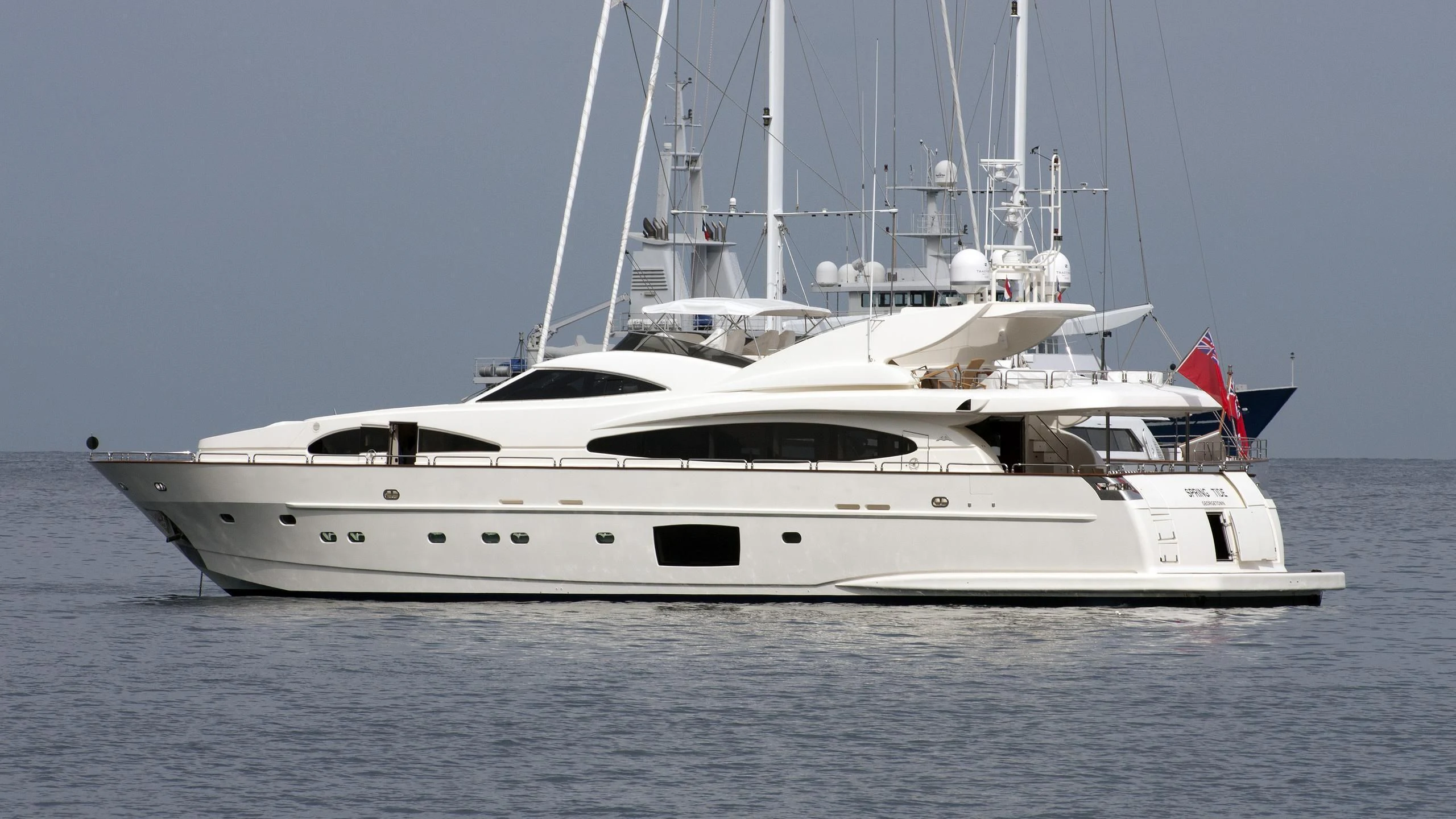 a white yacht on the water aboard SPRING TIDE Yacht for Sale