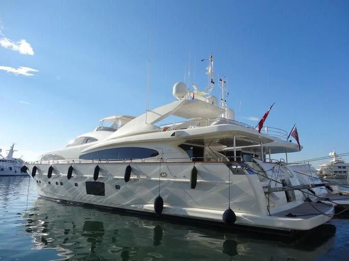 a large white boat in the water aboard SPRING TIDE Yacht for Sale