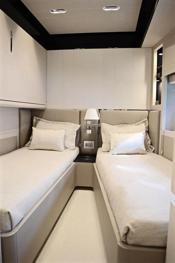 a couple of beds in a hotel room aboard MEMORIES Yacht for Sale