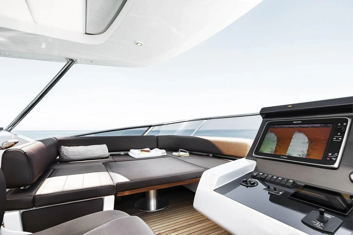 a car with a screen and a monitor on the dashboard aboard MEMORIES Yacht for Sale