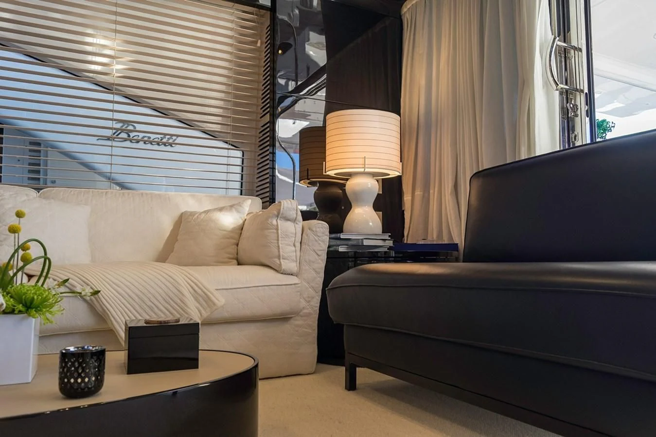 a living room with a couch and a lamp aboard MEMORIES Yacht for Sale
