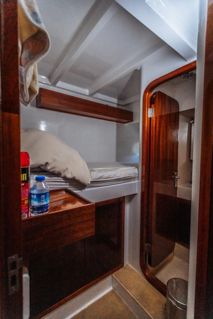 a bathroom with a sink and a mirror aboard LARIMAR Yacht for Sale