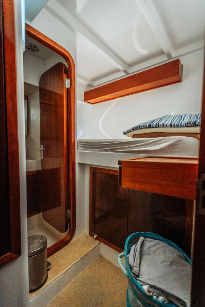 a closet with a door aboard LARIMAR Yacht for Sale