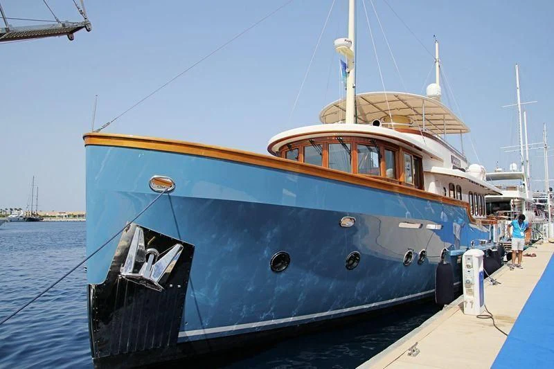 a boat docked at a pier aboard LARIMAR Yacht for Sale