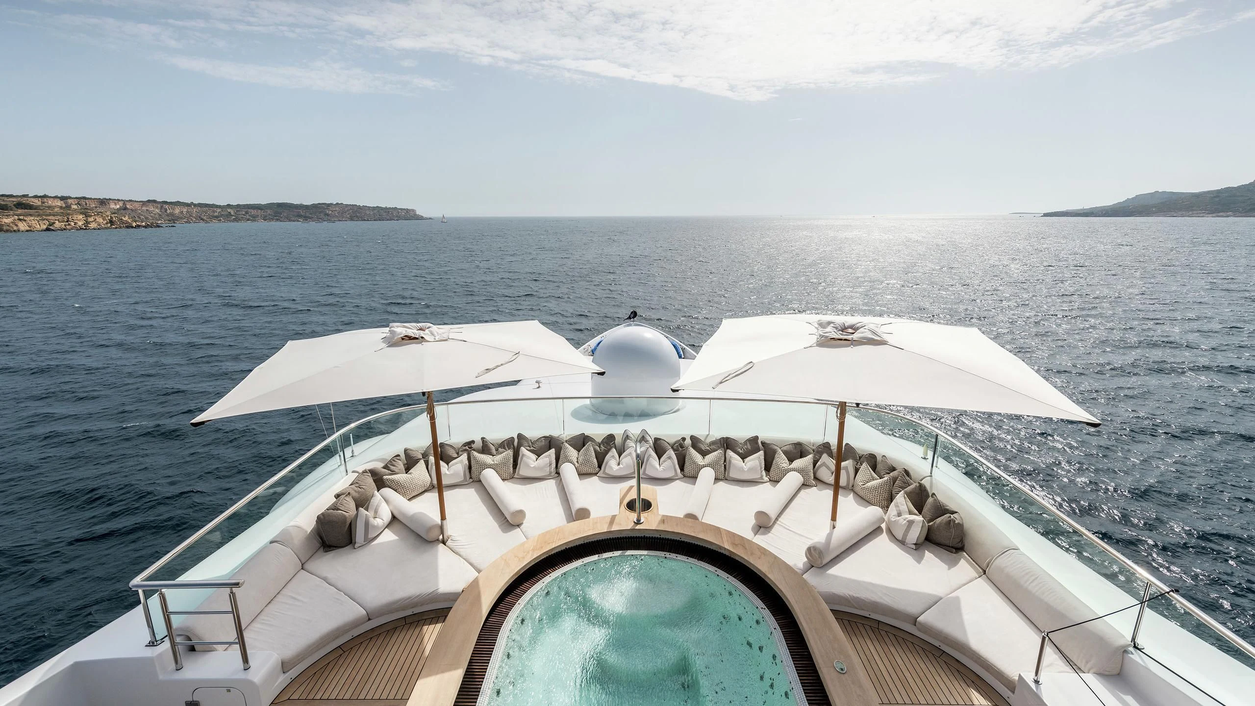 a boat with an umbrella on it aboard TALISMAN C Yacht for Charter