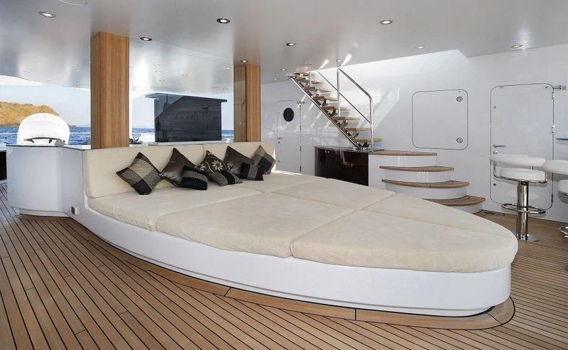 a large white bed in a room aboard TALISMAN C Yacht for Charter