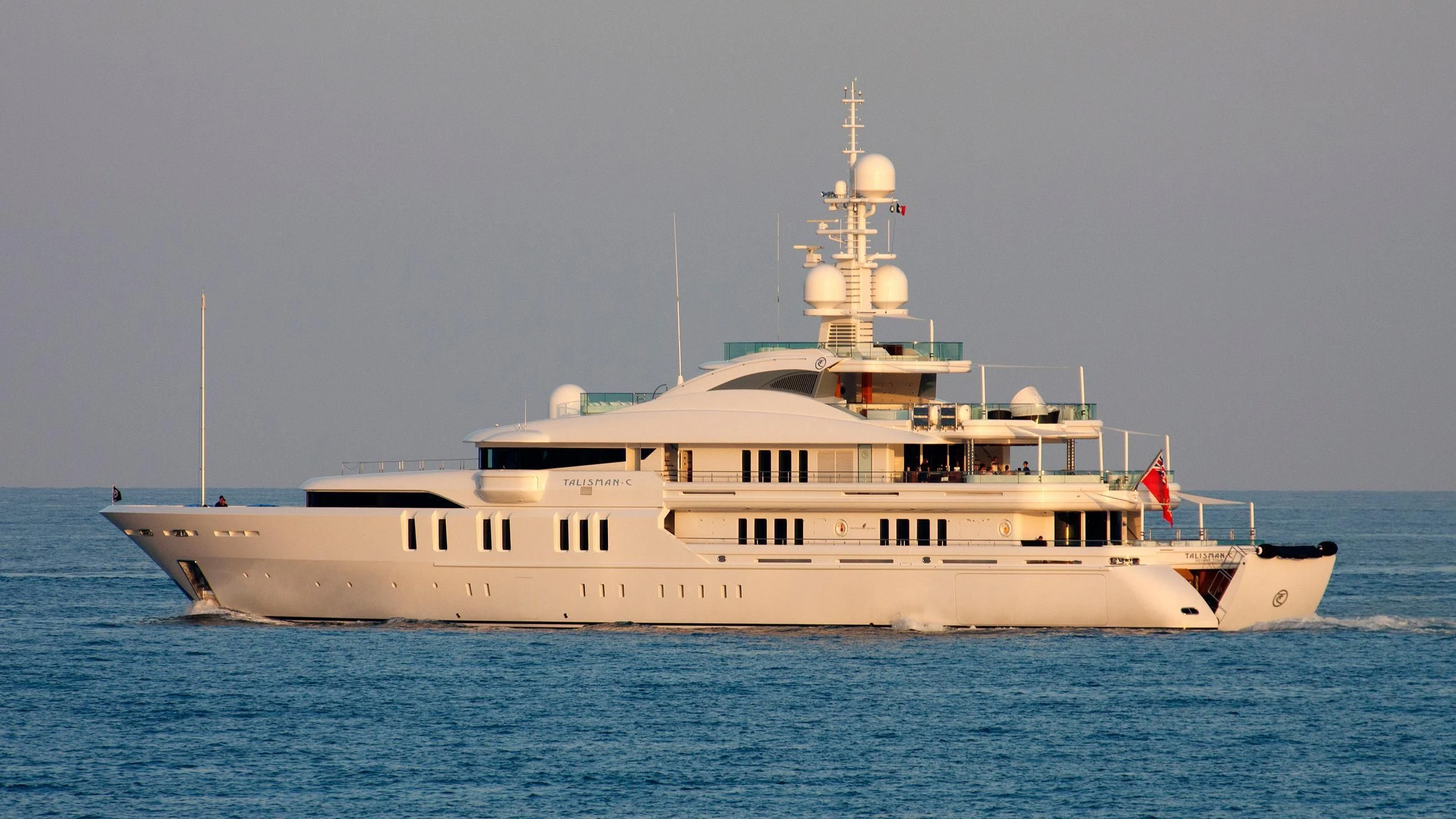a large white boat in the water aboard TALISMAN C Yacht for Charter