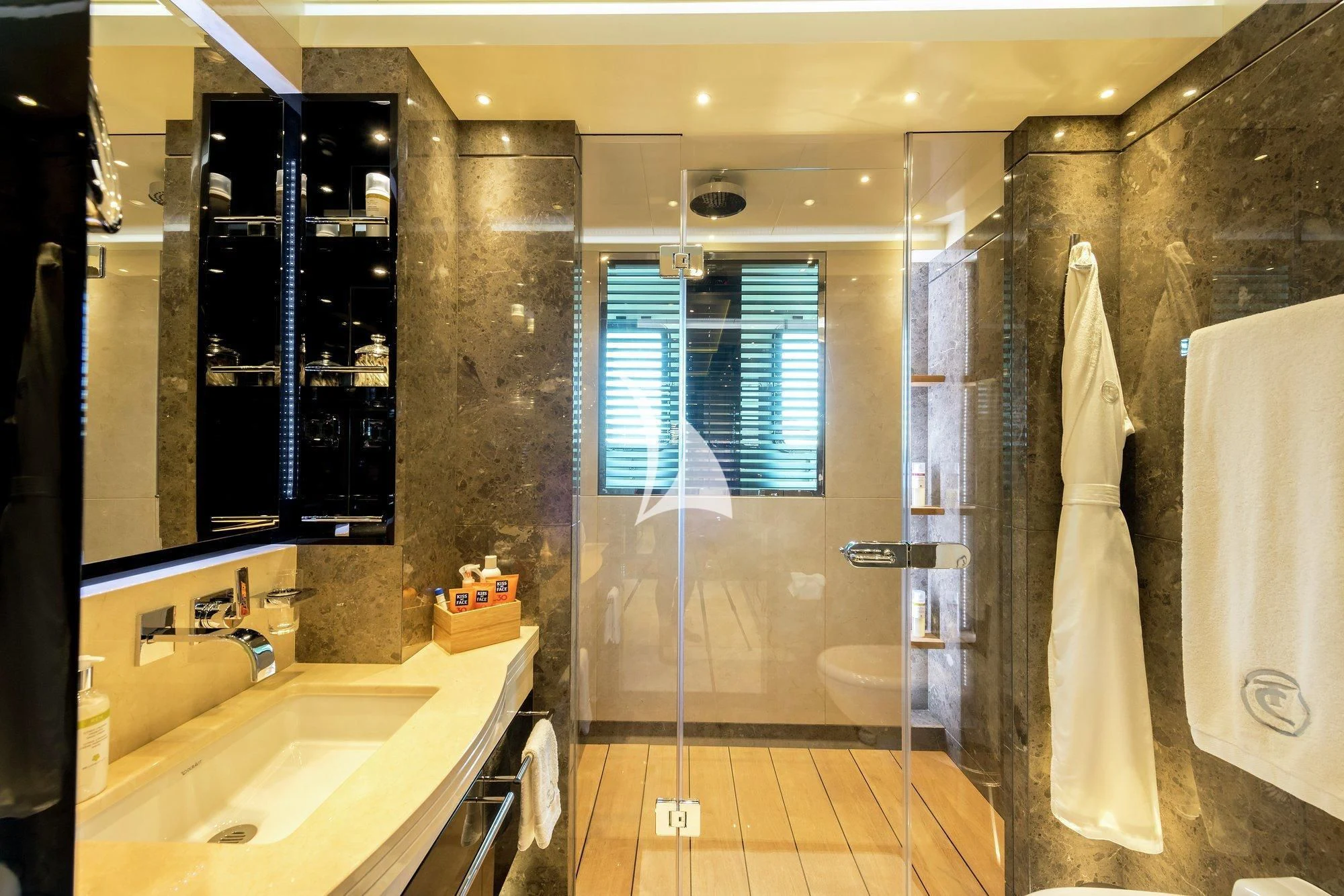 a bathroom with a glass shower aboard TALISMAN C Yacht for Charter