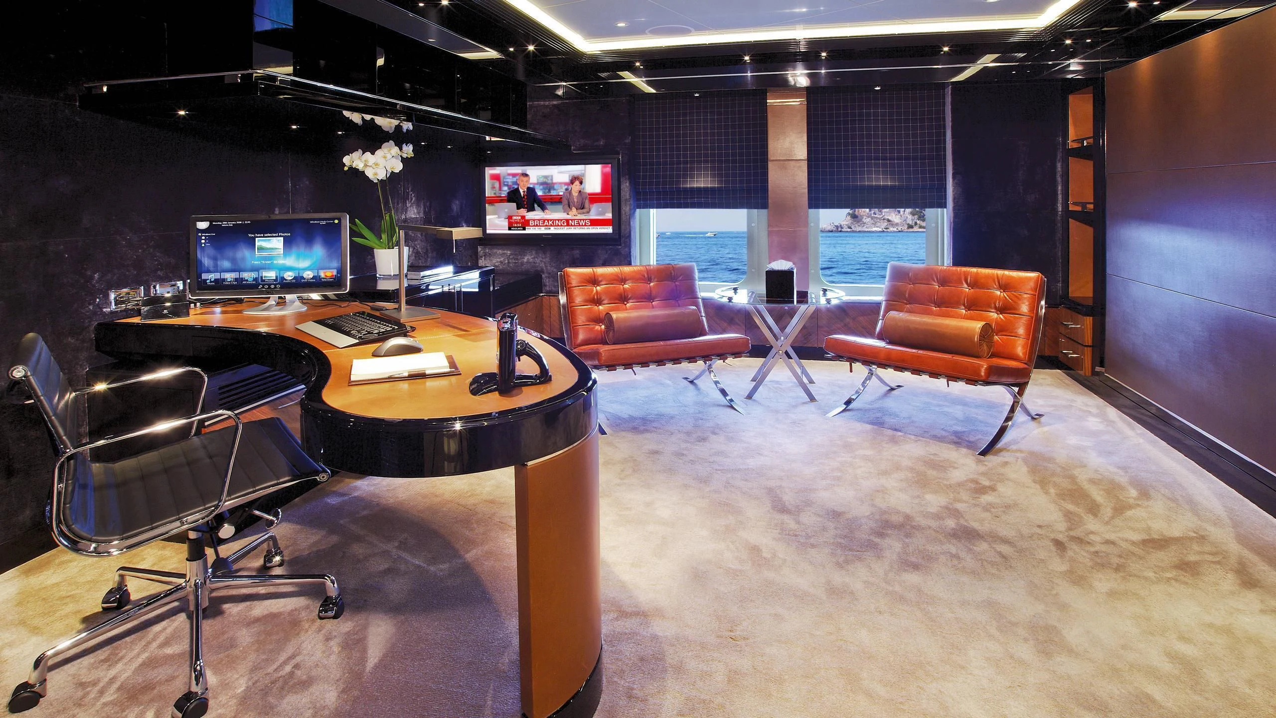 a room with a table and chairs aboard TALISMAN C Yacht for Charter