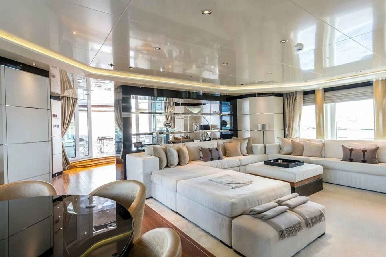 a living room with a large window aboard TALISMAN C Yacht for Charter