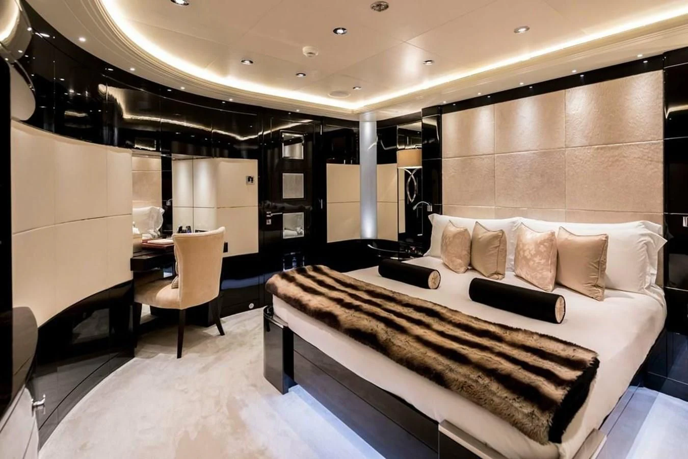 a large bed in a room aboard TALISMAN C Yacht for Charter