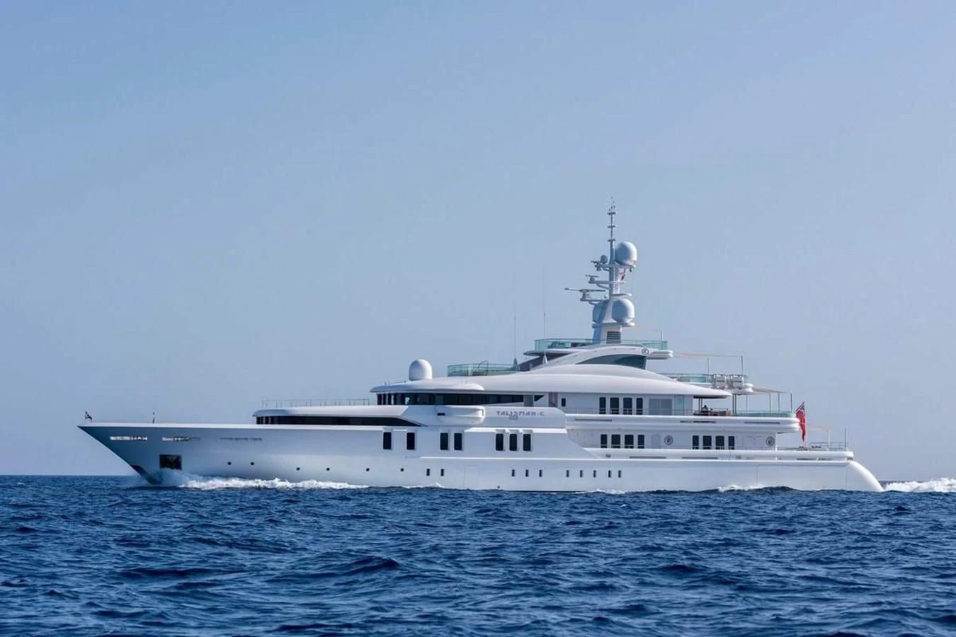 a large white boat in the water aboard TALISMAN C Yacht for Charter