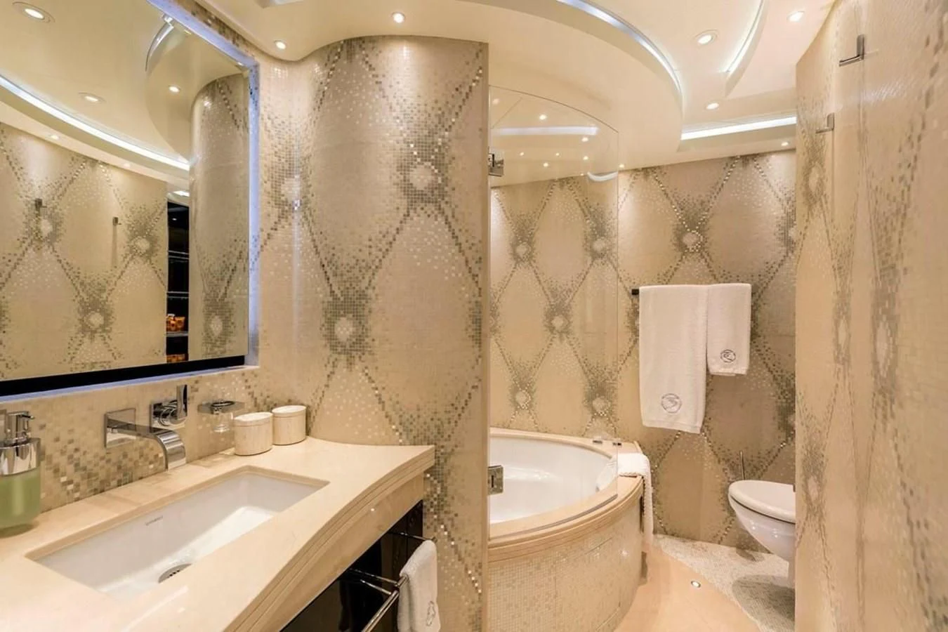 a bathroom with a sink and a toilet aboard TALISMAN C Yacht for Charter