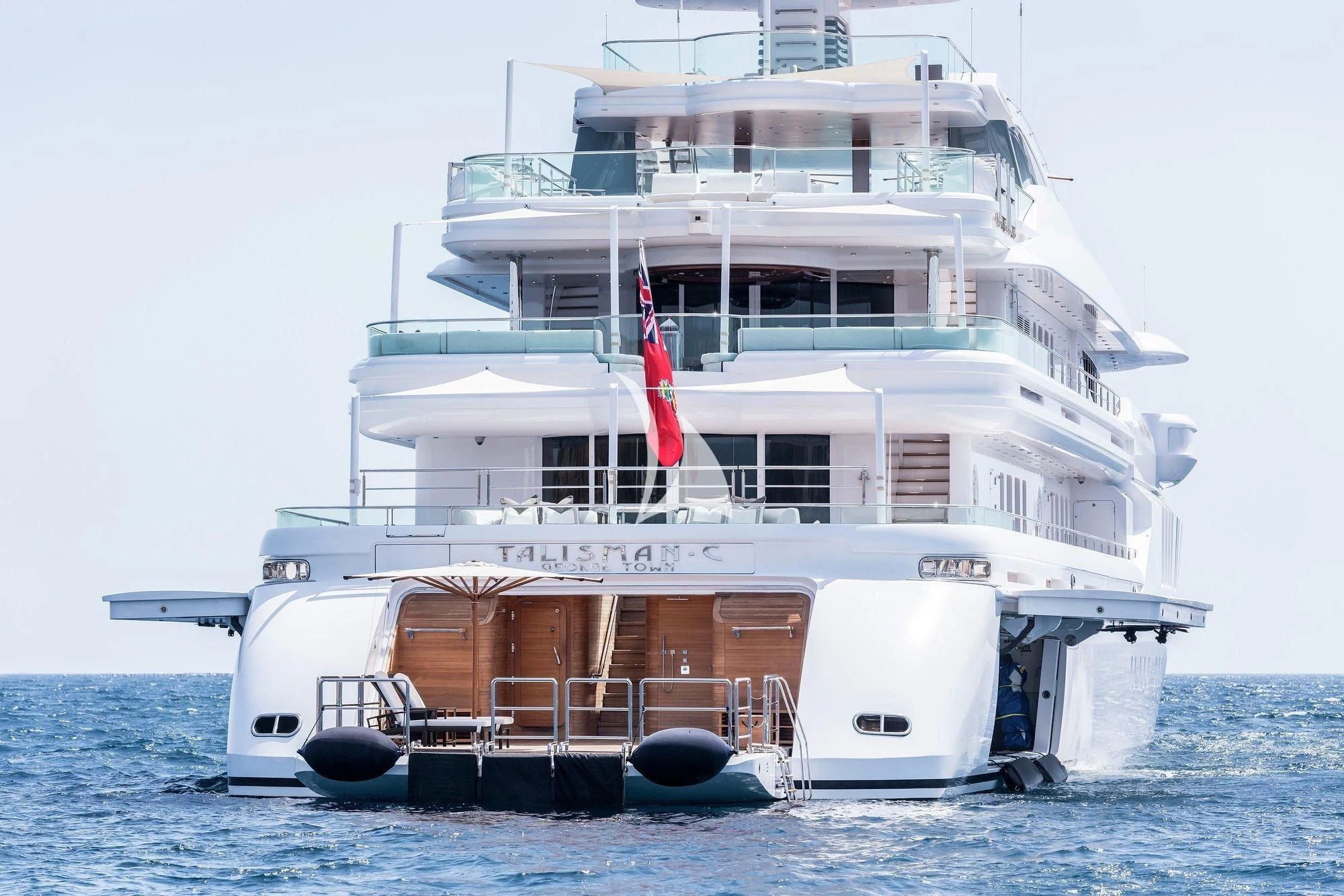 a large white boat on the water aboard TALISMAN C Yacht for Charter