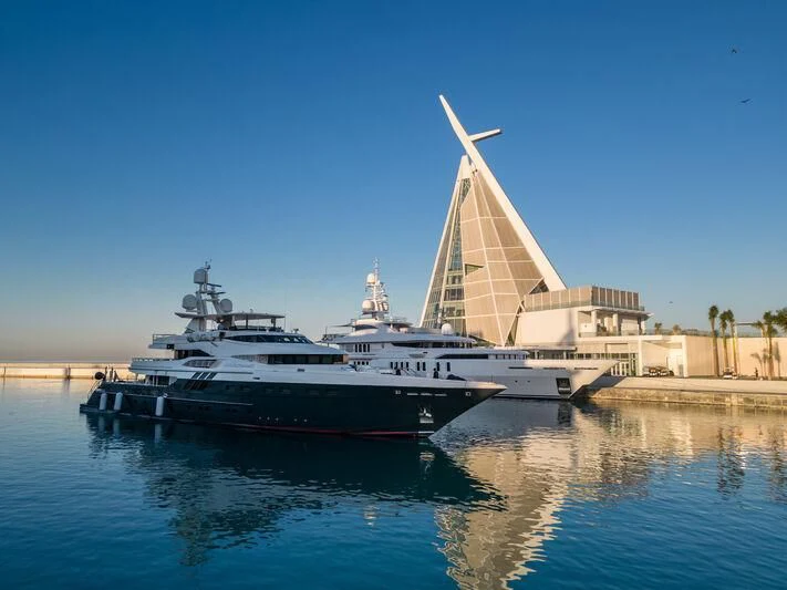 a large white boat in the water aboard TALISMAN C Yacht for Charter