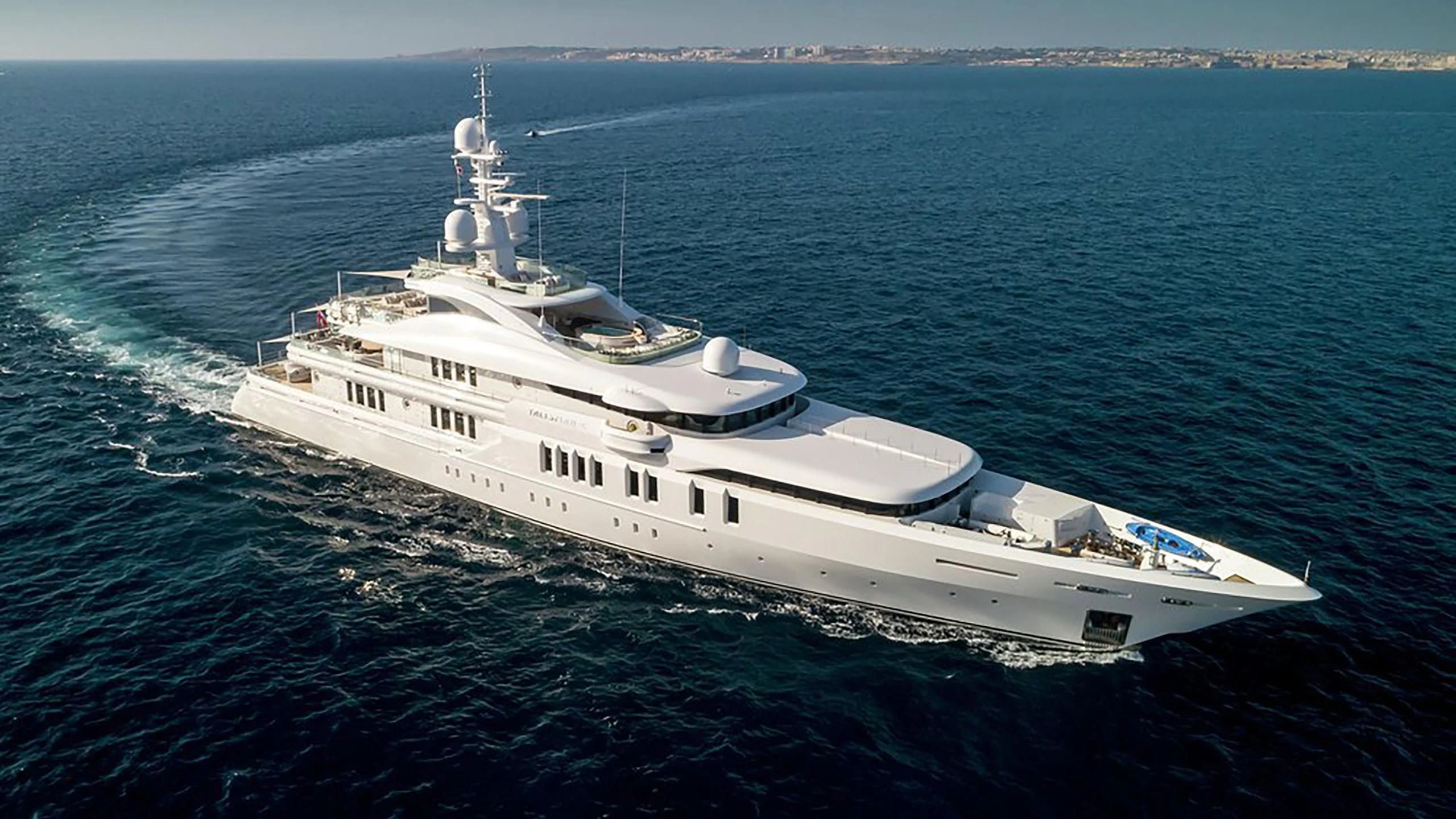 a large white ship in the ocean aboard TALISMAN C Yacht for Charter