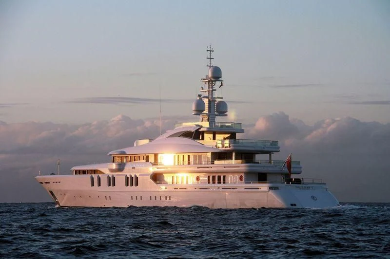a large white ship in the water aboard TALISMAN C Yacht for Charter