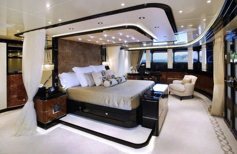 a large bed in a room aboard TALISMAN C Yacht for Charter