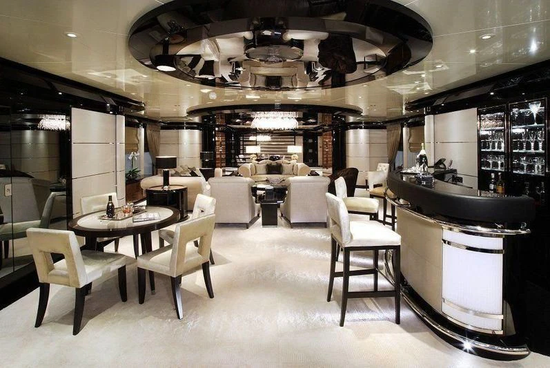 a large room with tables and chairs aboard TALISMAN C Yacht for Charter