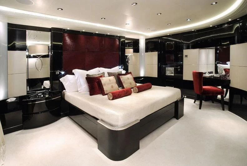a large bed in a room aboard TALISMAN C Yacht for Charter