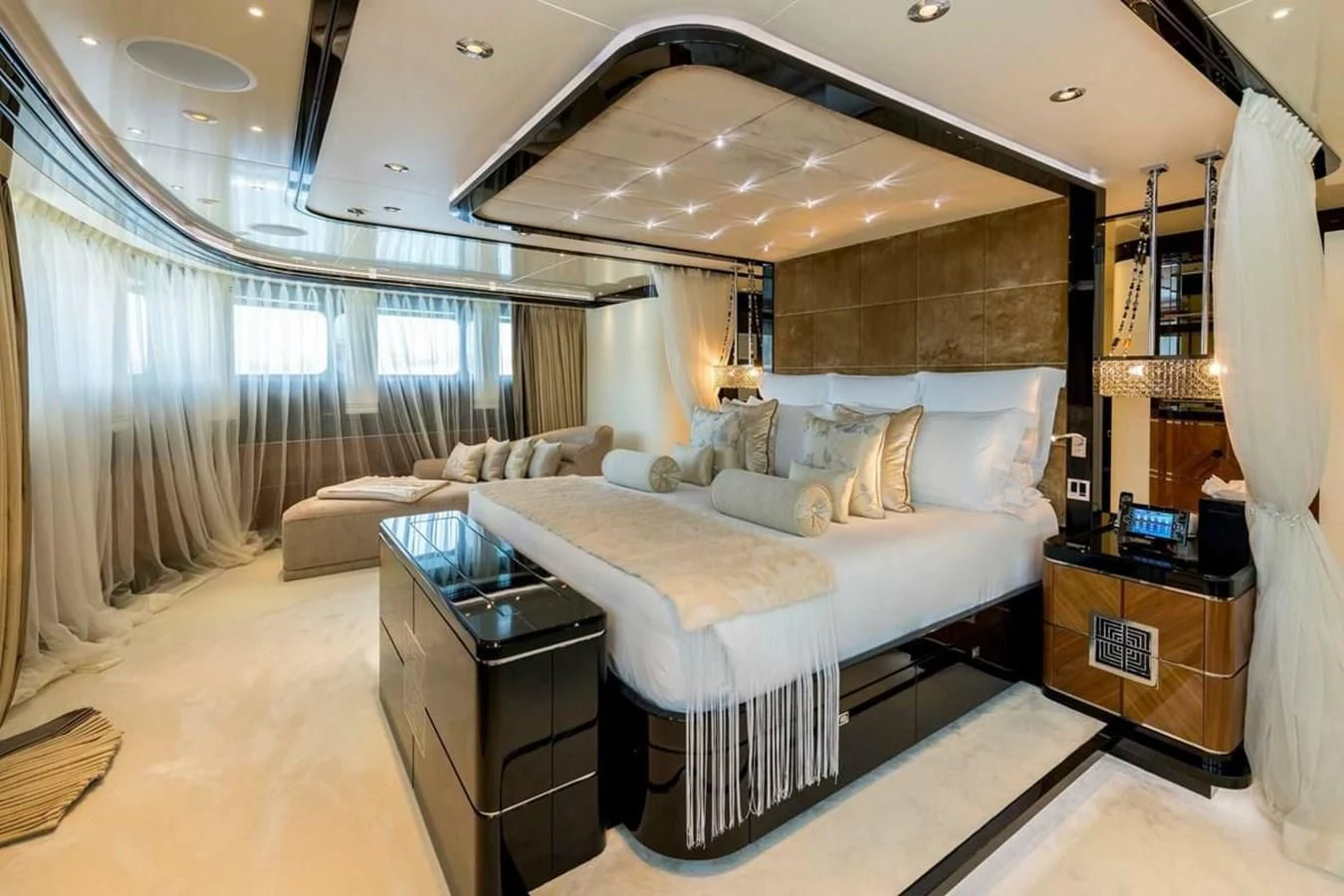 a large bedroom with a large bed aboard TALISMAN C Yacht for Charter