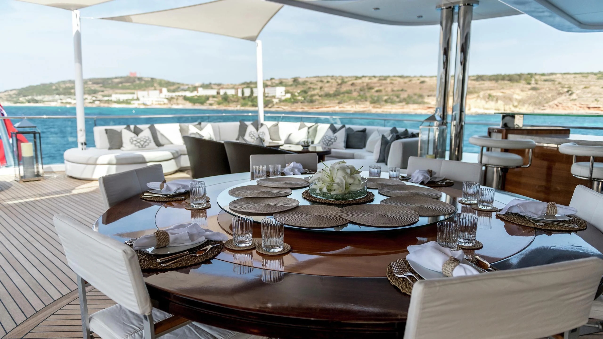 a table set for a dinner aboard TALISMAN C Yacht for Charter