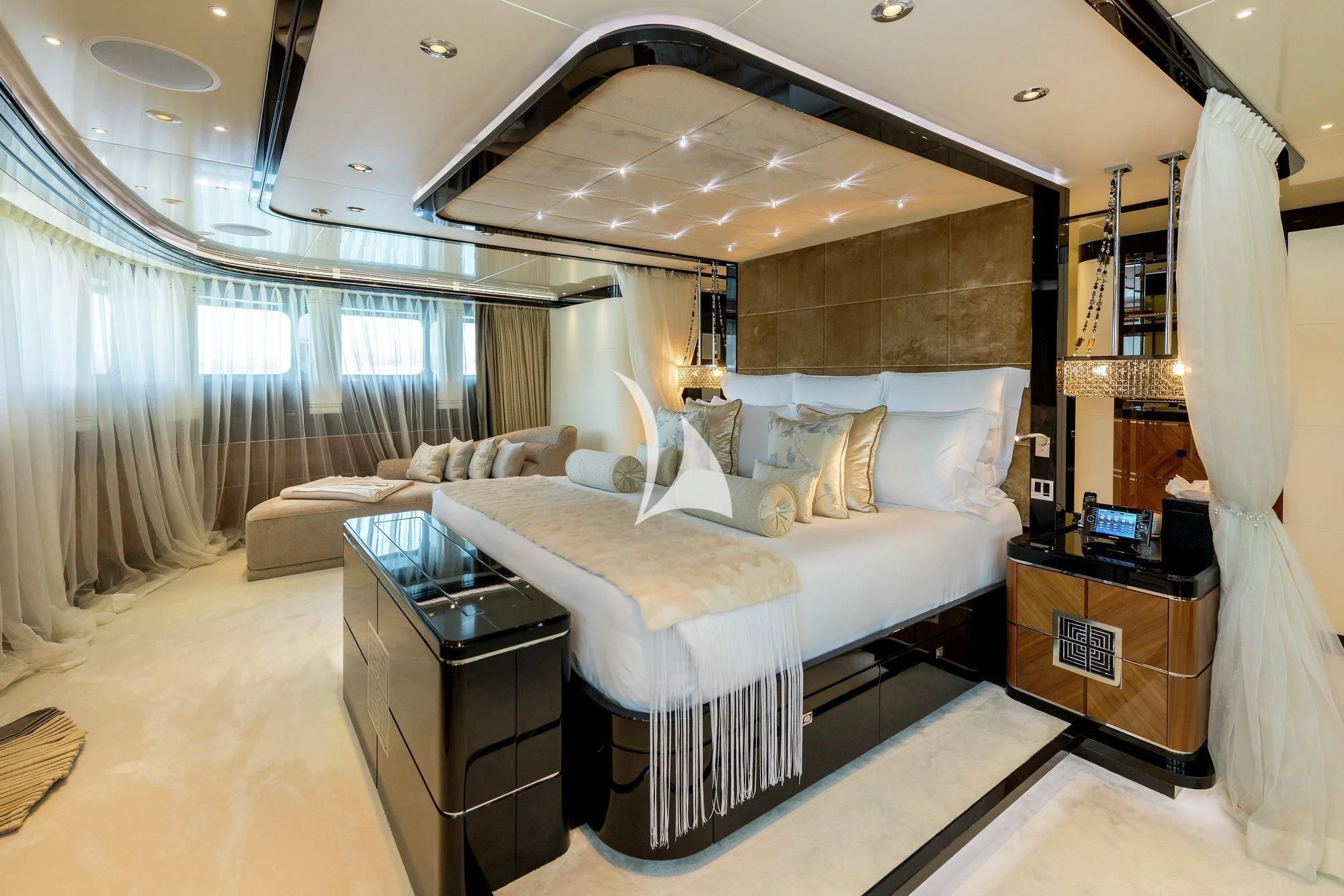 a large bedroom with a large bed aboard TALISMAN C Yacht for Charter