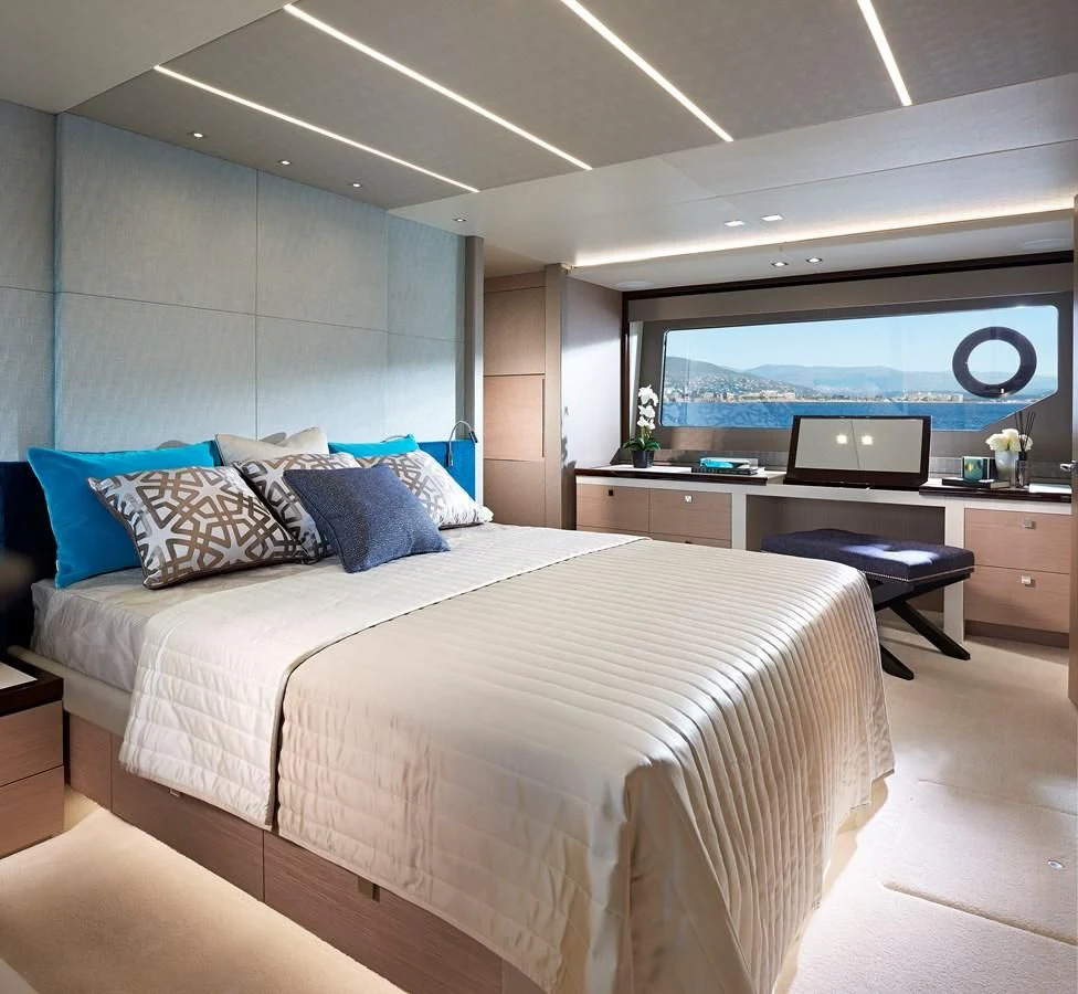 a bedroom with a bed and a tv aboard 76 YACHT Yacht for Sale