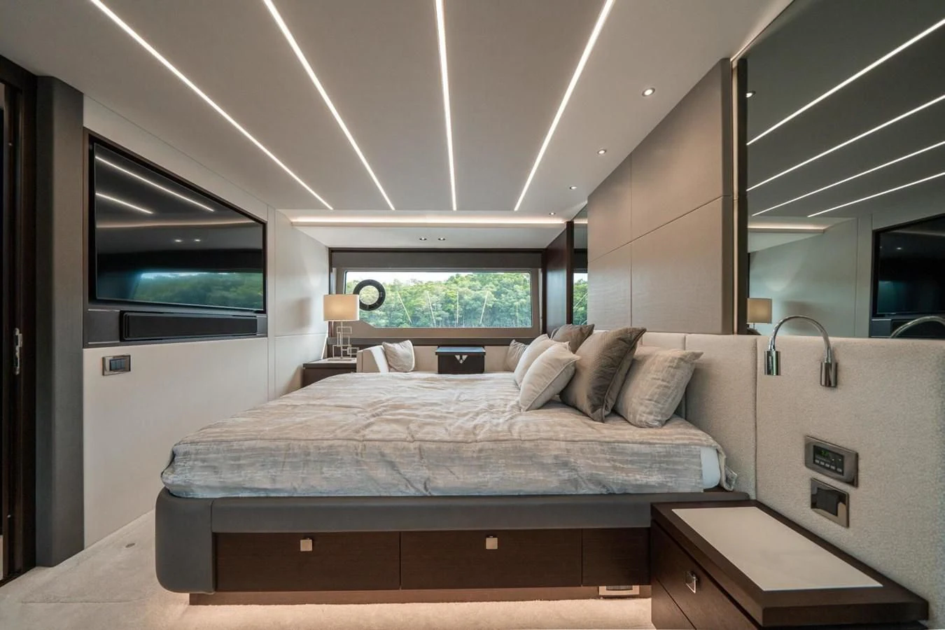a bedroom with a bed and a tv aboard 76 YACHT Yacht for Sale