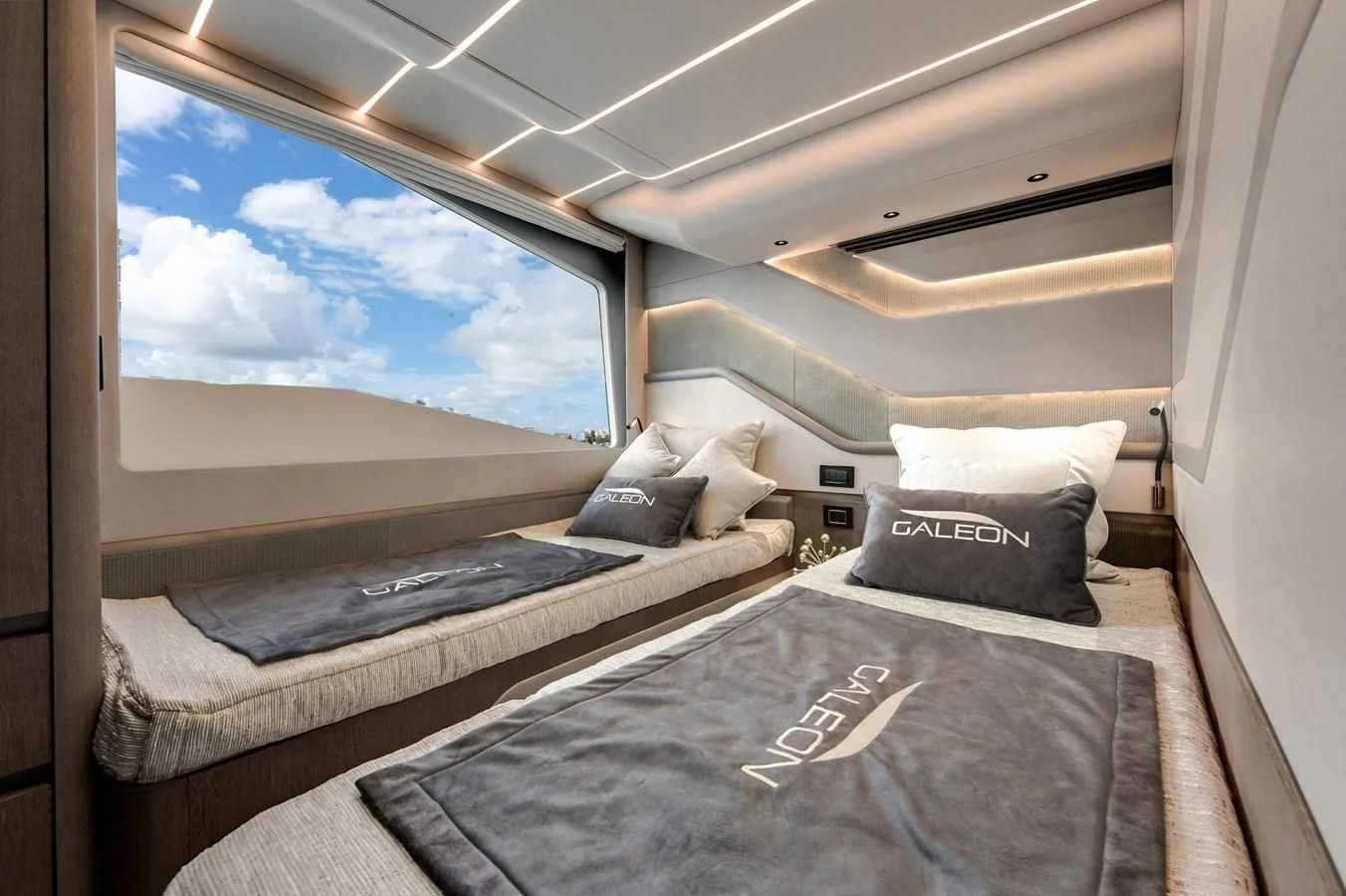 a room with a bed and a window aboard 76 YACHT Yacht for Sale