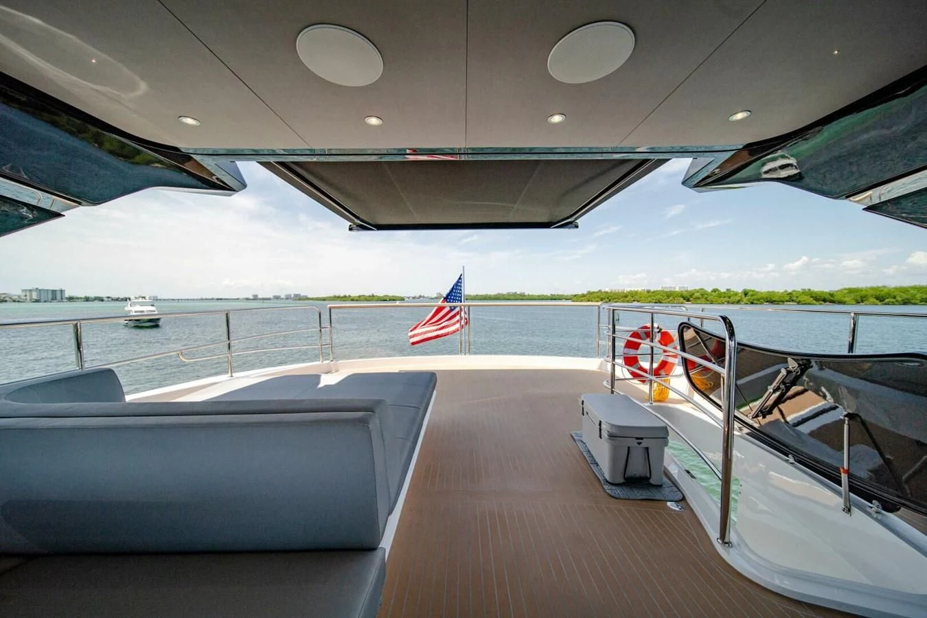 a deck with a flag on it aboard 76 YACHT Yacht for Sale