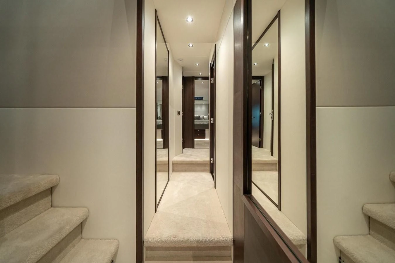 a hallway with a staircase and a bench aboard 76 YACHT Yacht for Sale
