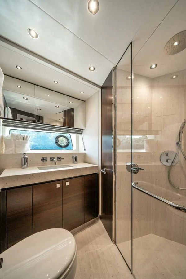 a bathroom with a glass shower aboard 76 YACHT Yacht for Sale