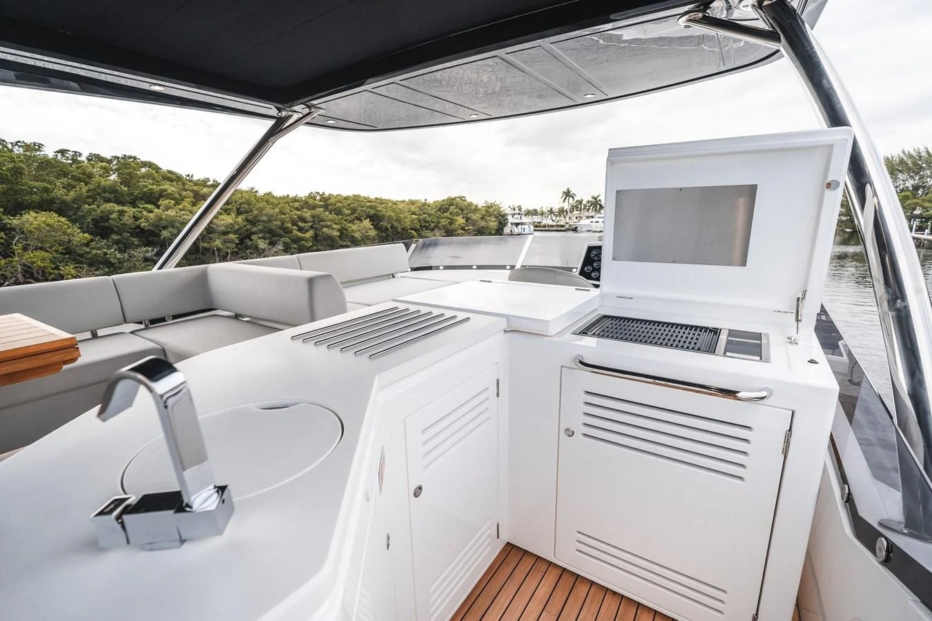 a car with a microwave and a printer in it aboard 76 YACHT Yacht for Sale