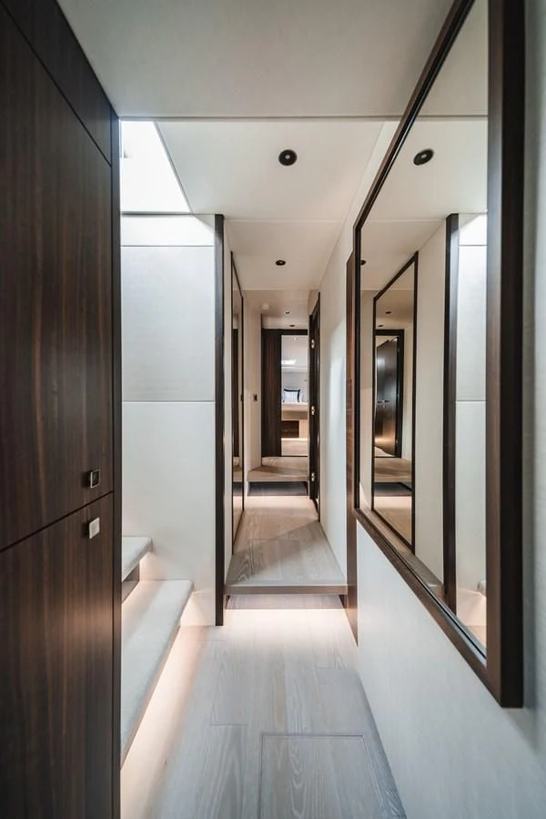 a hallway with doors aboard 76 YACHT Yacht for Sale