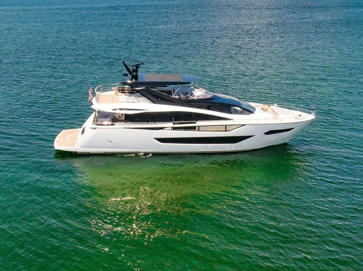 a white boat in the water aboard 76 YACHT Yacht for Sale