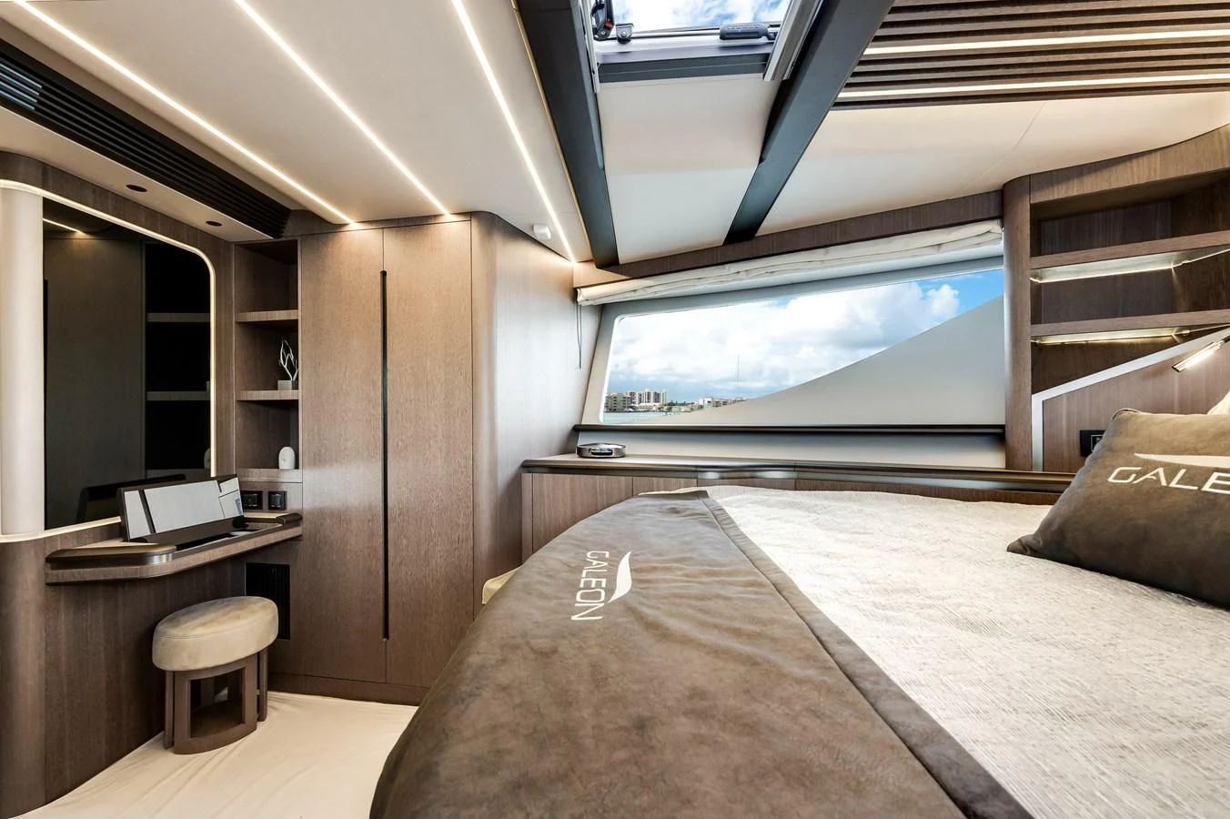 a bedroom with a bed and a tv aboard 76 YACHT Yacht for Sale