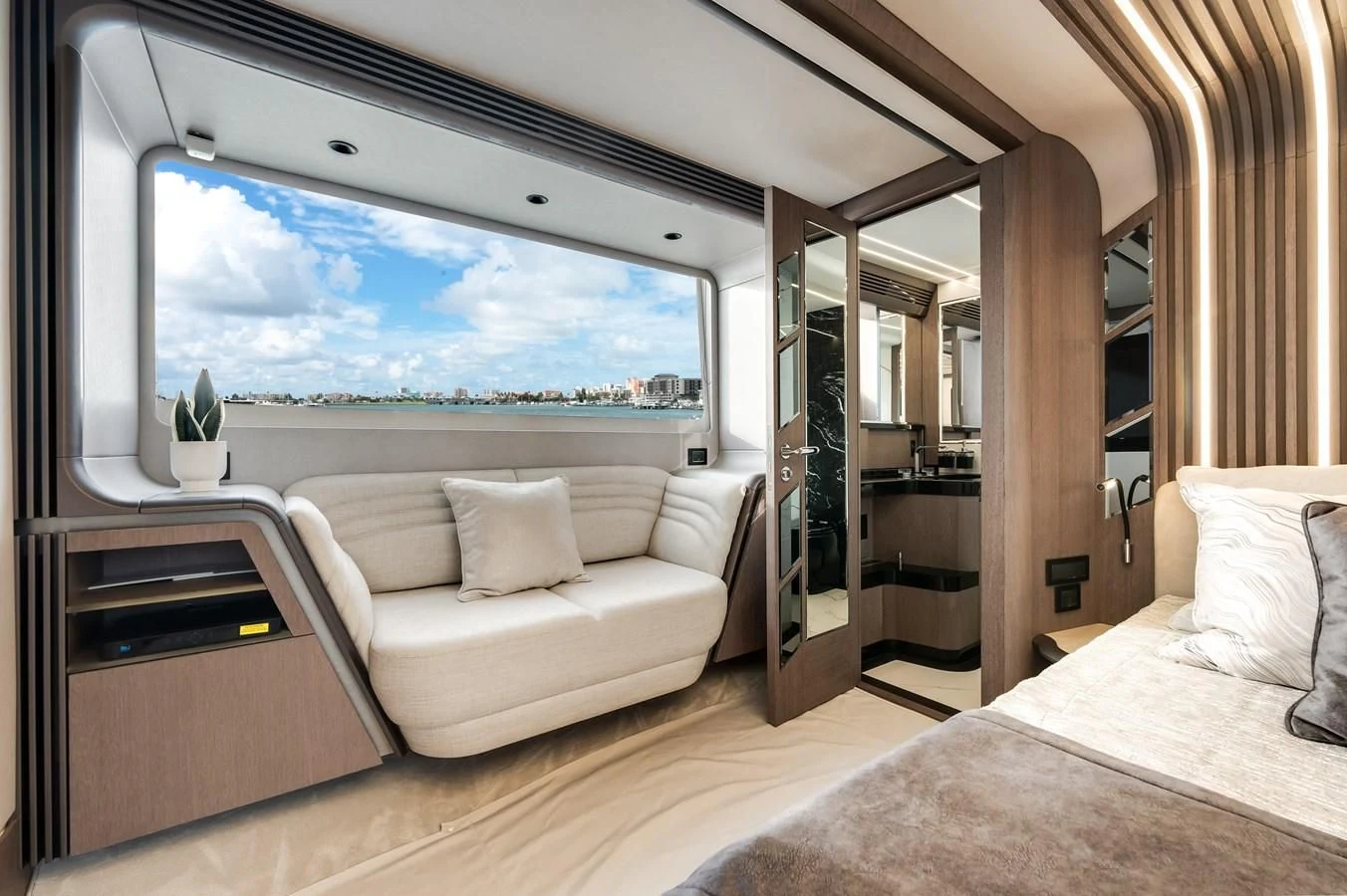 a room with a bed and a large window aboard 76 YACHT Yacht for Sale