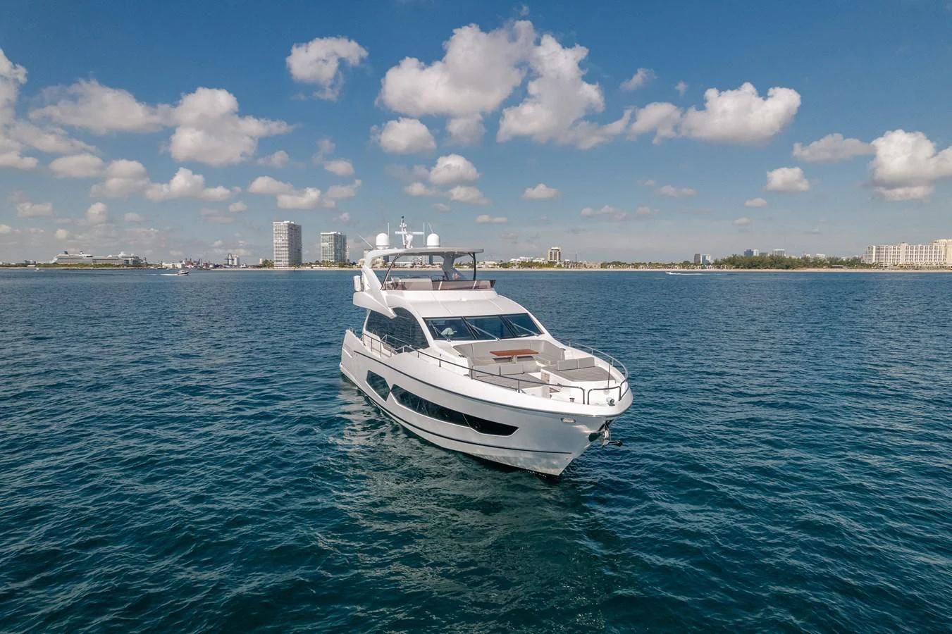 a white boat in the water aboard 76 YACHT Yacht for Sale