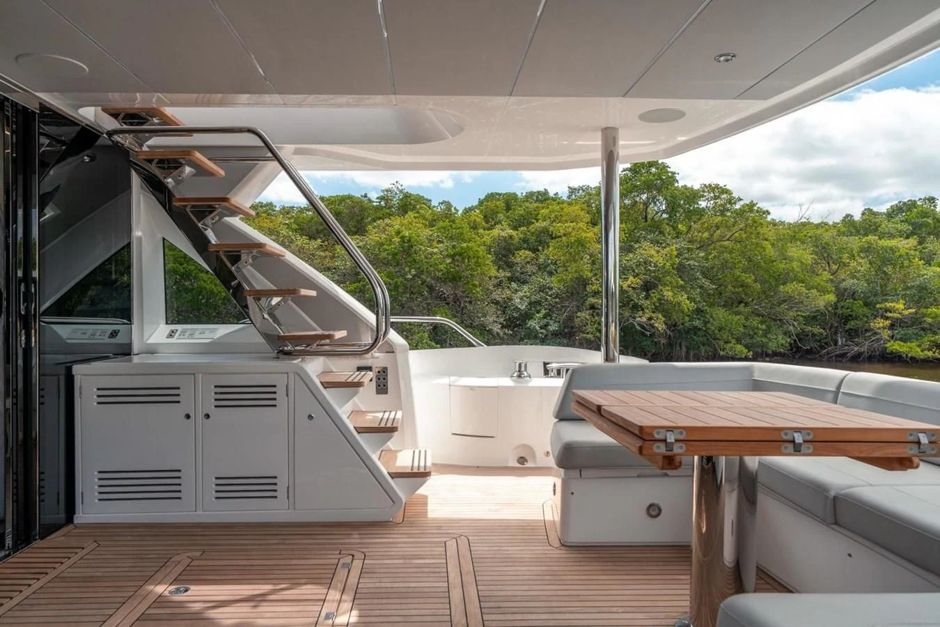 a room with a table and a large window aboard 76 YACHT Yacht for Sale