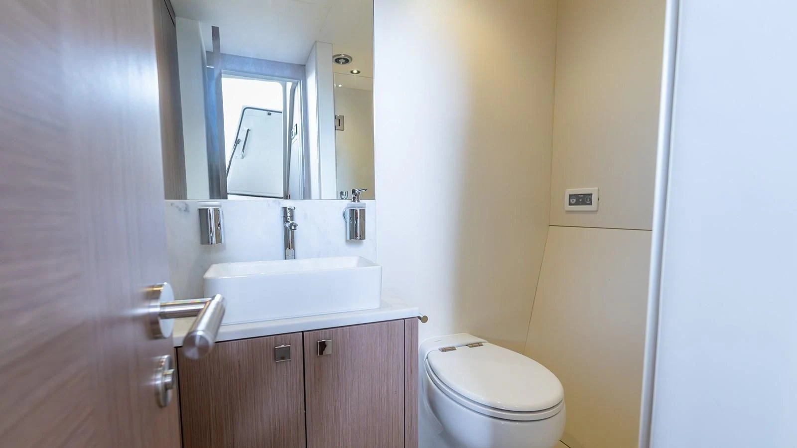 a bathroom with a sink and a toilet aboard 76 YACHT Yacht for Sale