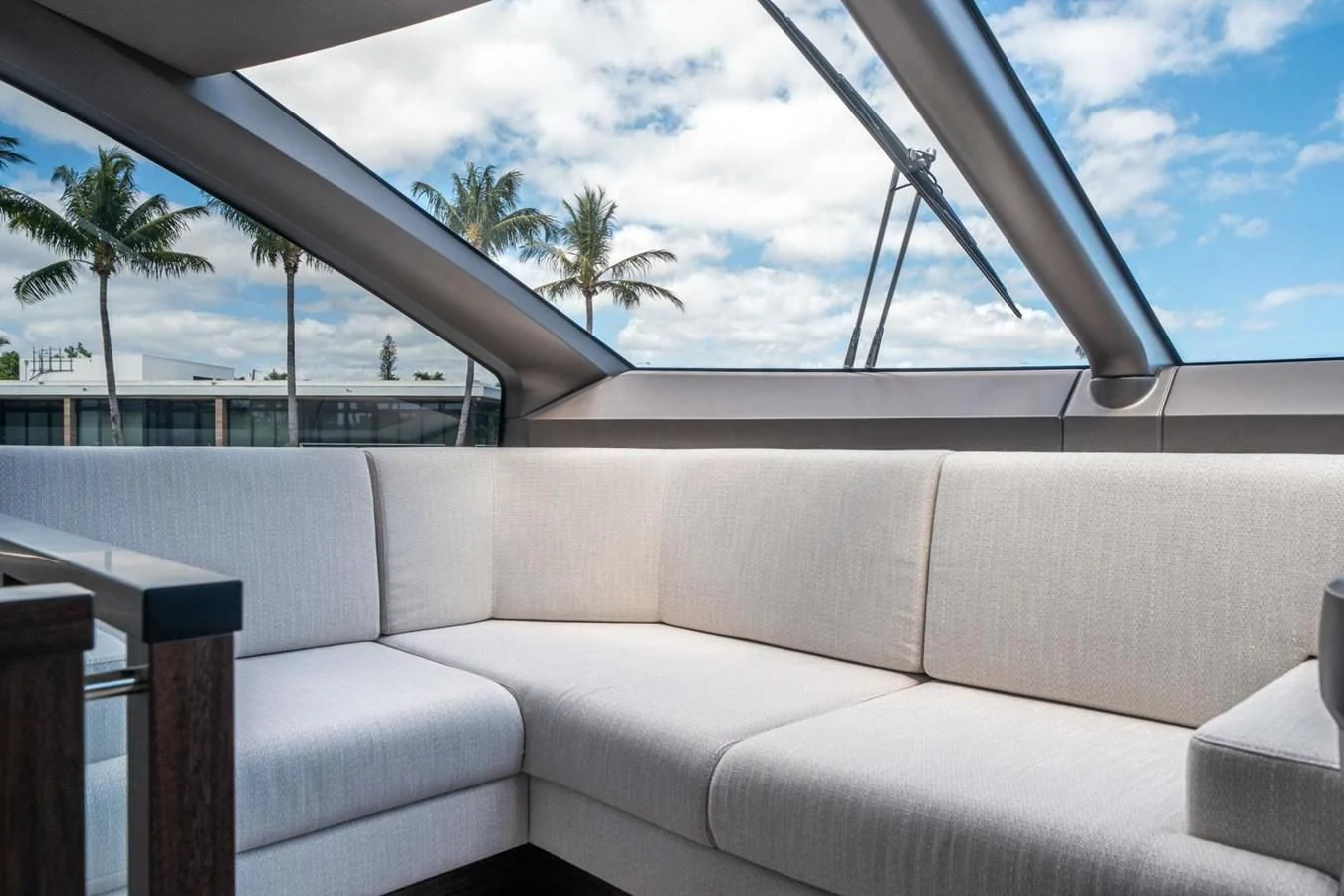 a white couch in a room aboard 76 YACHT Yacht for Sale
