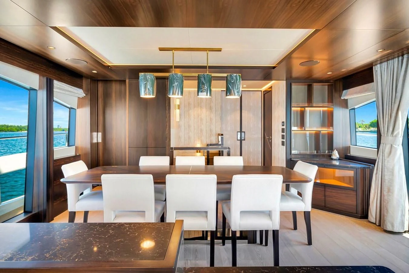 a room with tables and chairs aboard 76 YACHT Yacht for Sale
