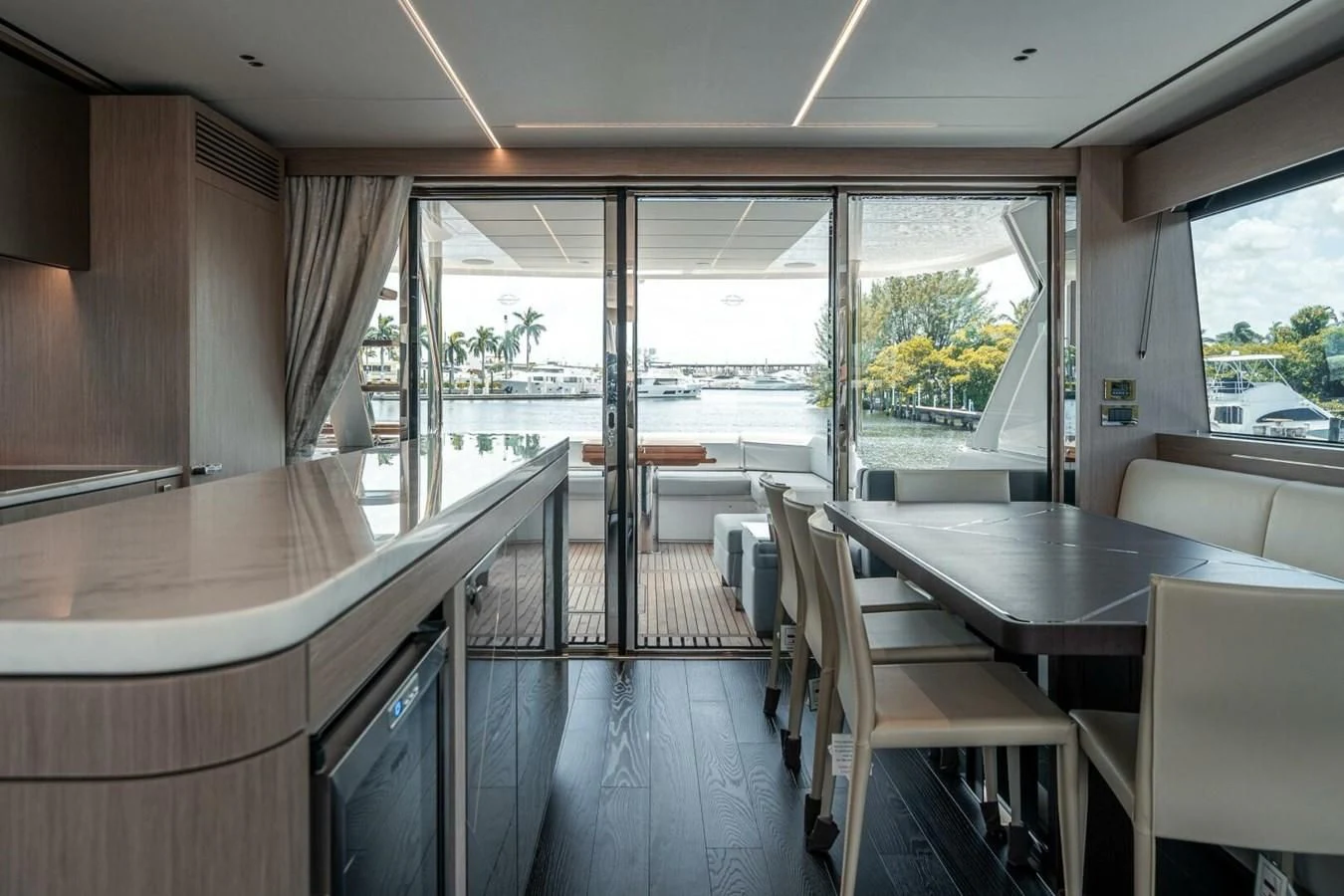a room with tables and chairs aboard 76 YACHT Yacht for Sale