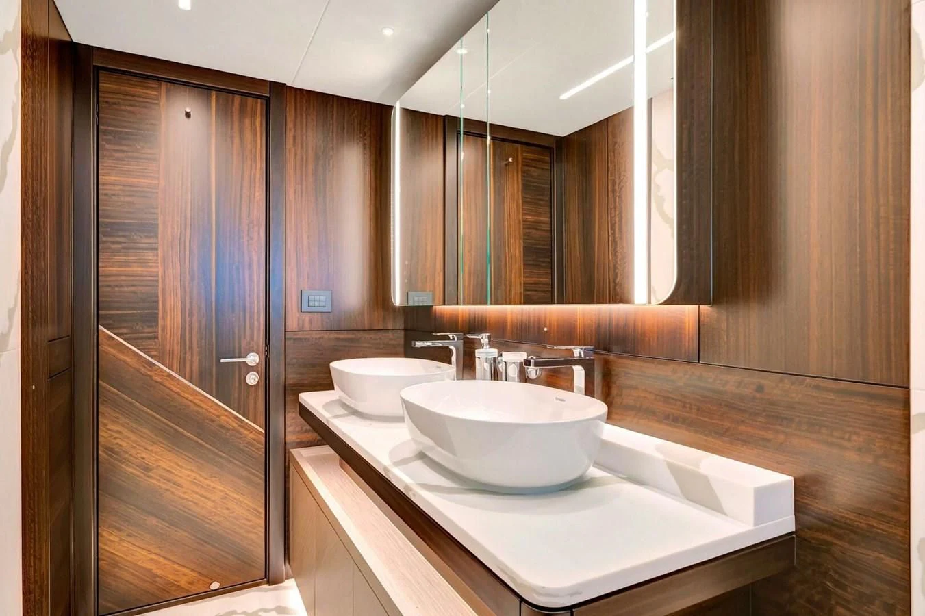 a bathroom with two sinks aboard 76 YACHT Yacht for Sale