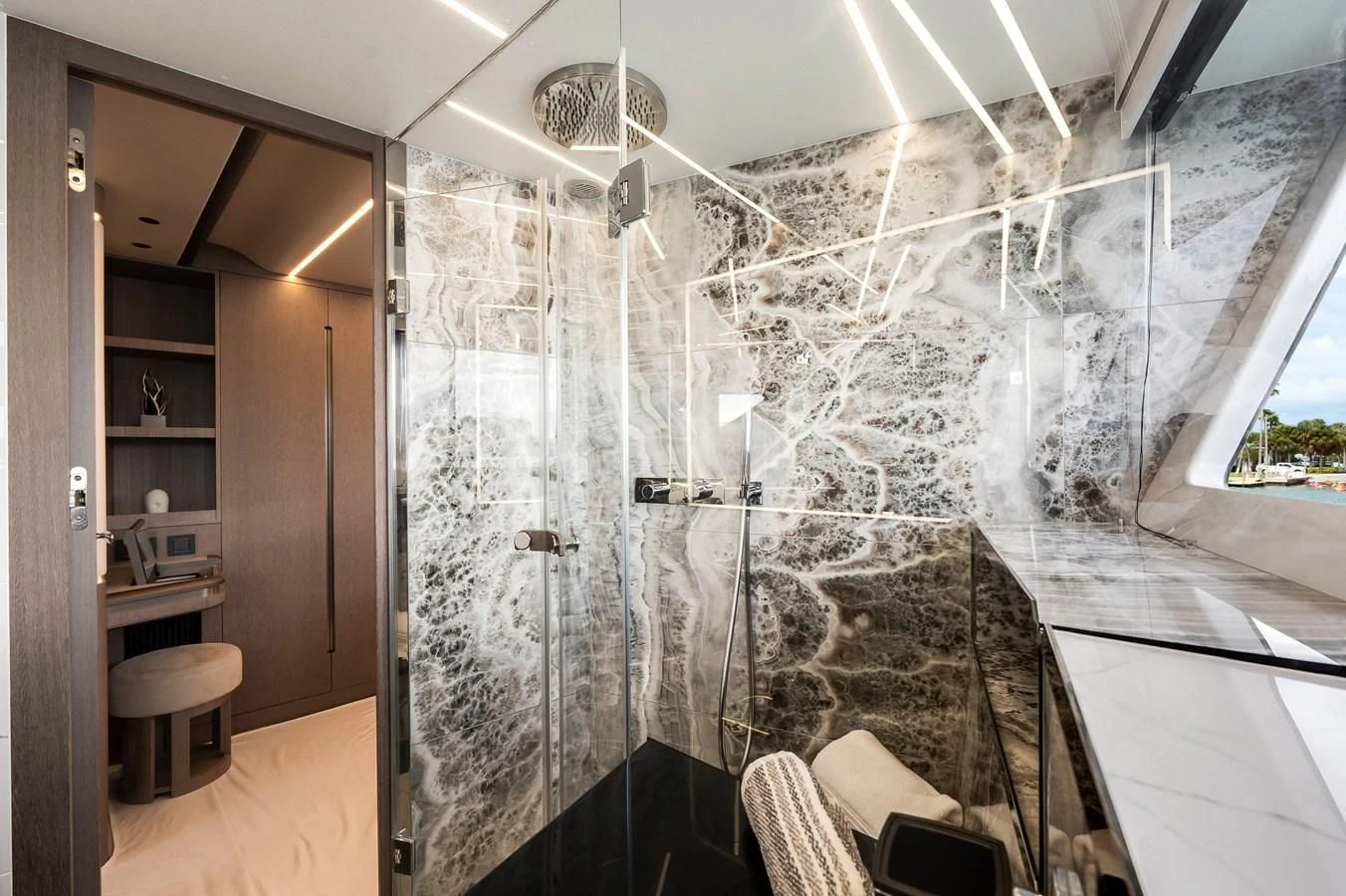 a large bathroom with a glass shower aboard 76 YACHT Yacht for Sale